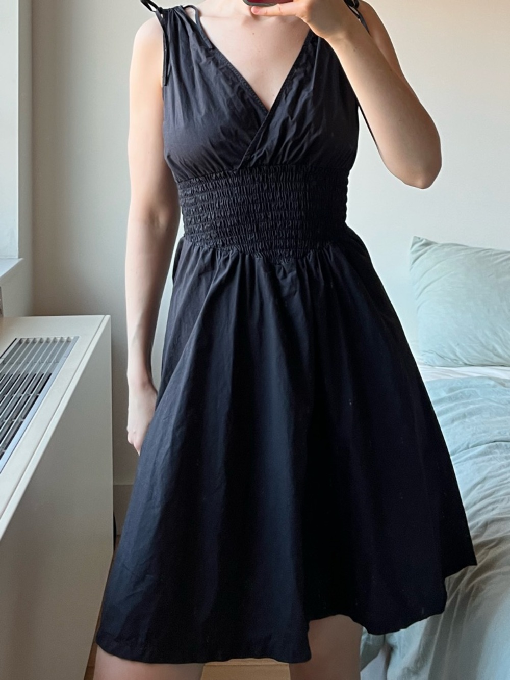 Black mini dress with smocked waist